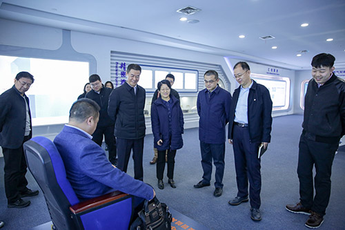 国家开发银行苏州分行行长王少丹一行到访老街玉祥集团公司
